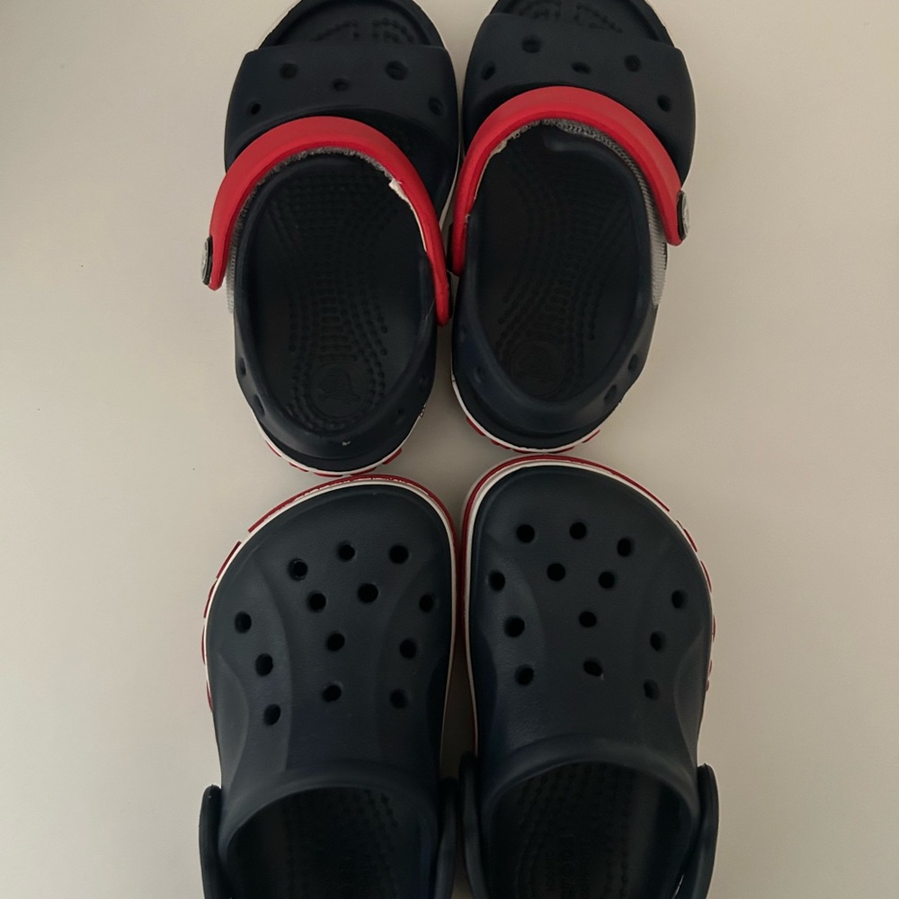 Two pairs of toddler navy and red crocs size 5